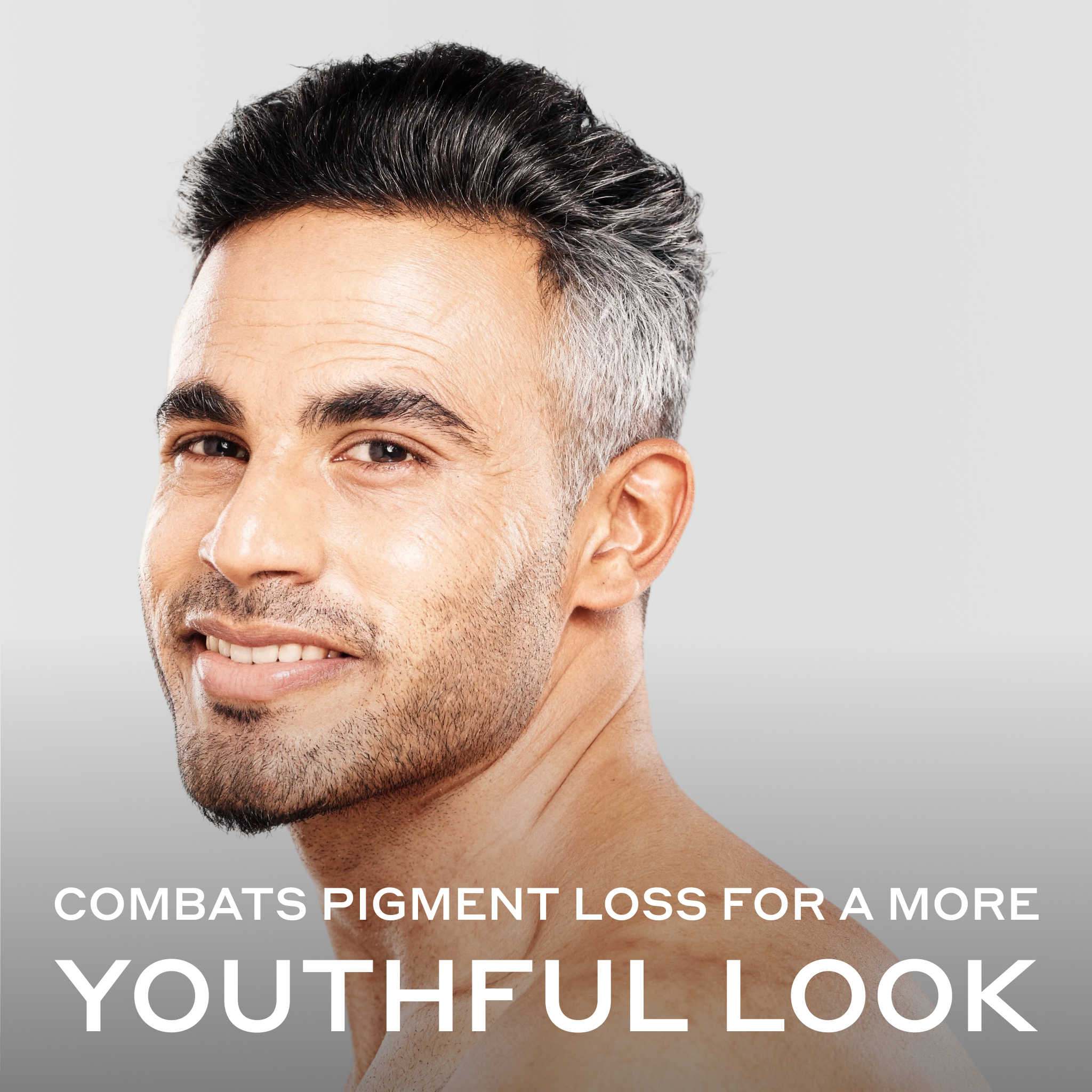 Man with naturally graying hair representing a youthful, refreshed appearance after using Zenagen Eclipse Color Preservation and Gray Support Shampoo
