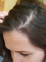 women's after image showing thicker fuller hair after ten weeks 