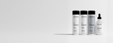 Zenagen Revolve hair care collection featuring men's shampoo, women's shampoo, conditioner, and densifying hair serum for fine and visibly thinning hair.